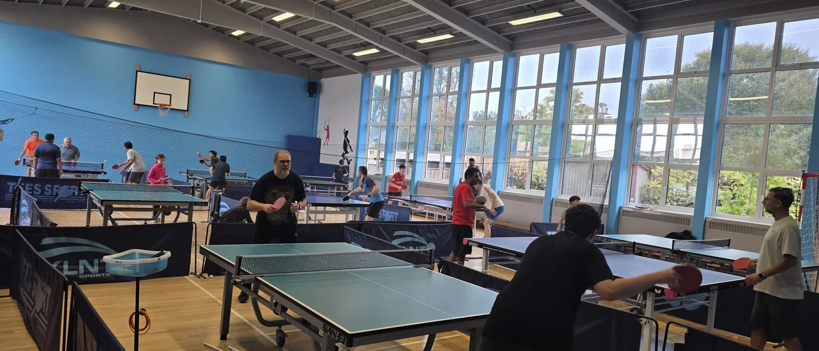 A lively daytime table tennis session at Pankhurst Gym